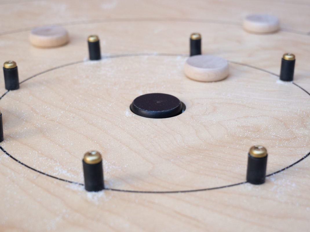 Crokinole,Board,Where,Black,Has,Scored